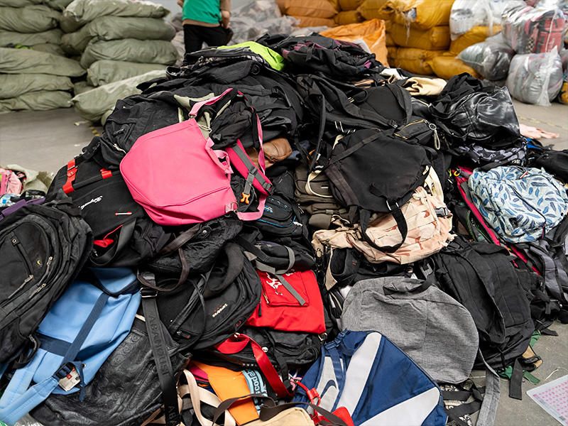 A pile of used bags to be sorted by our team